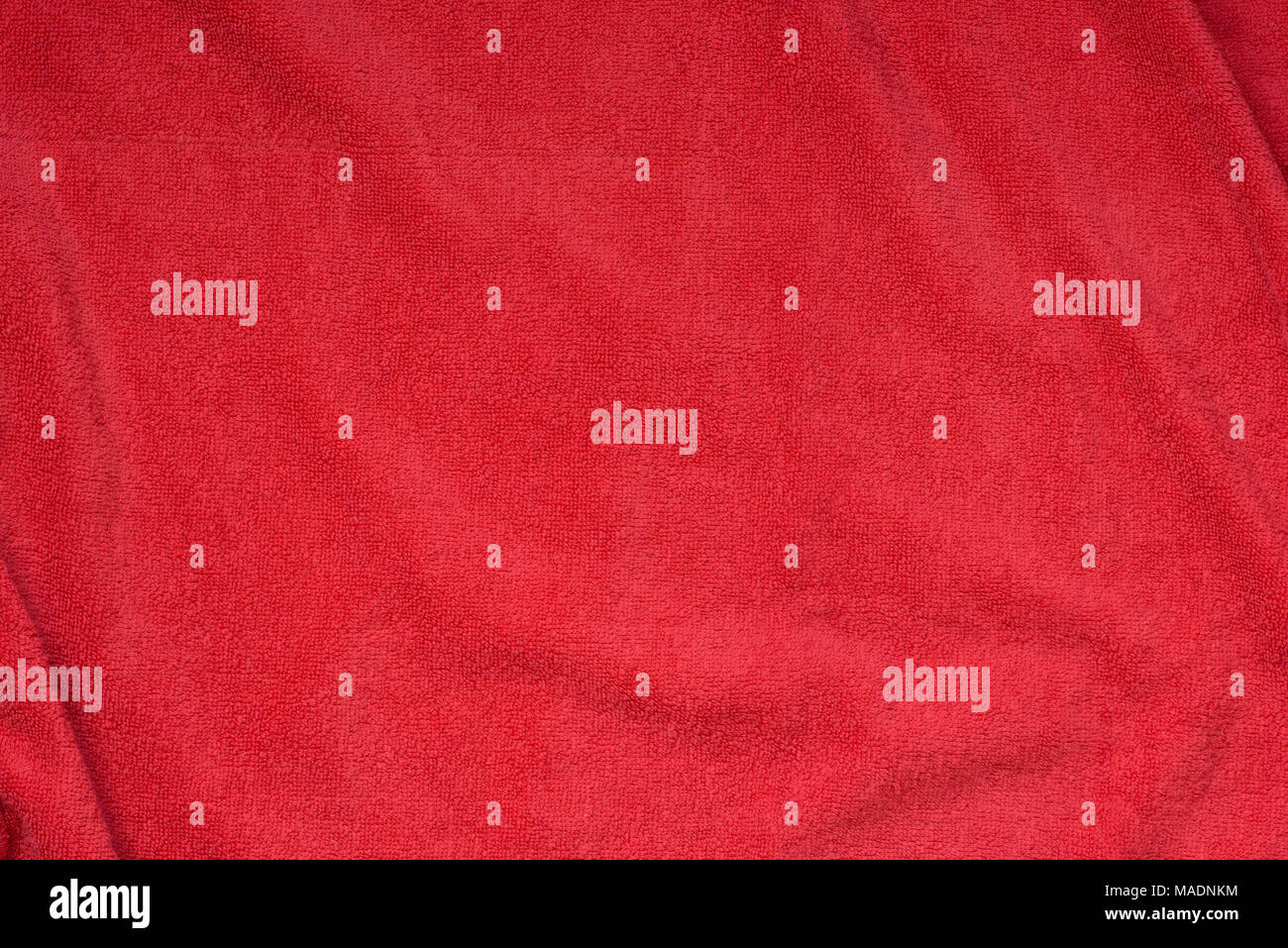 Couleur rouge serviette éponge texture background Banque D'Images