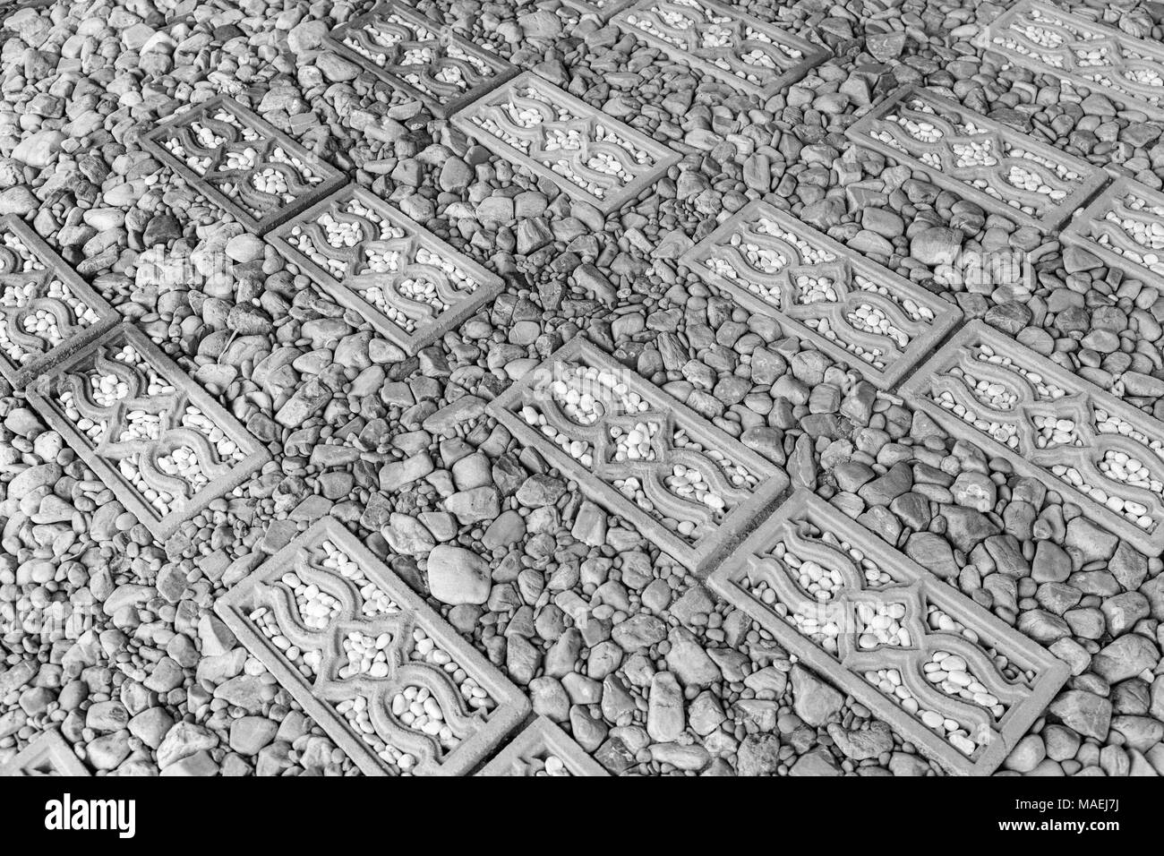 Chemin de gravier du surface granuleuse , pierre et briques pour l'arrière-plan Banque D'Images