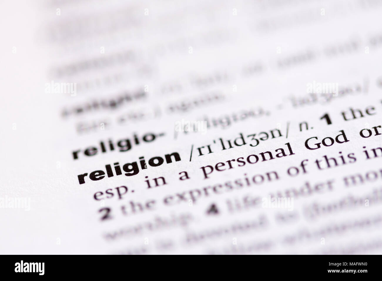 Une macro shot montrant la définition du mot religion dans un dictionnaire anglais Banque D'Images