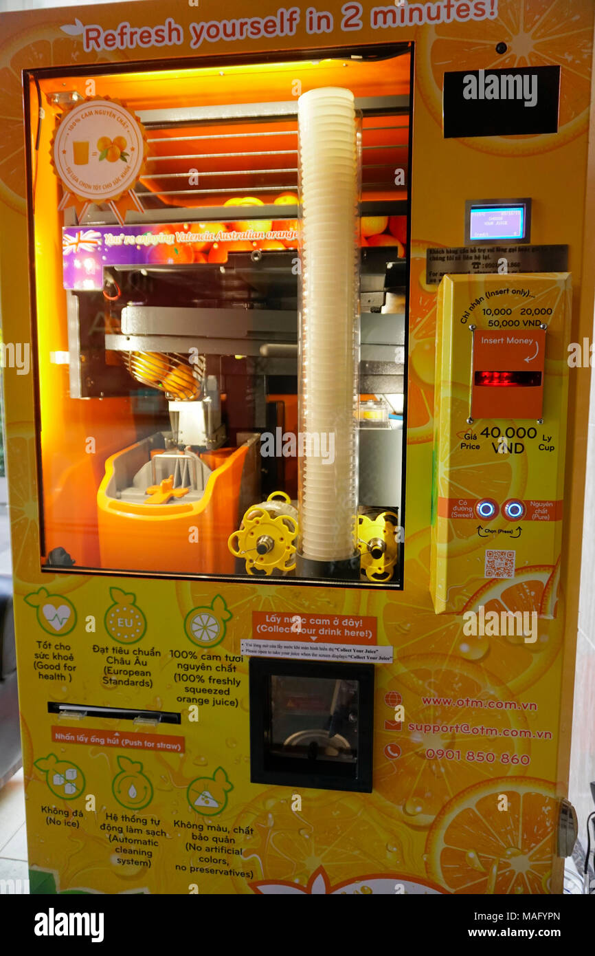 Jus d'orange frais distributeur automatique, Vietnam Photo Stock - Alamy