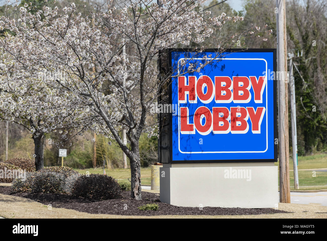 WILSON, NC - Mars 28, 2018 : l'Hobby Lobby signe à l'entrée du stationnement à l'emplacement de Wilson, NC. Banque D'Images