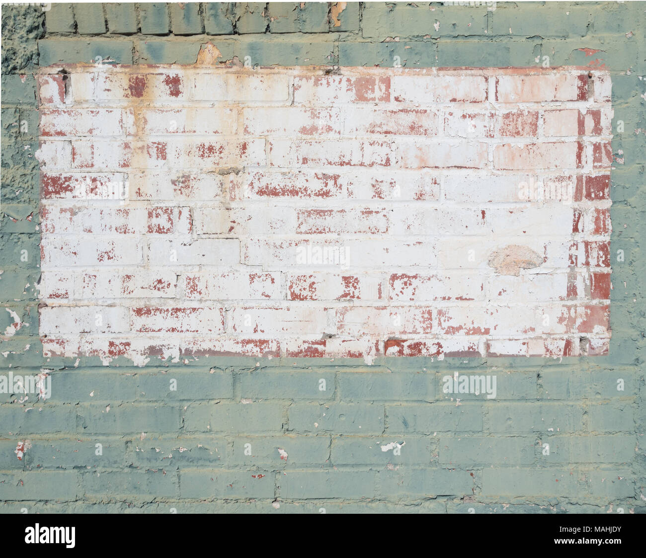 Close up de mur de brique rectangulaire peinte en vert ou blanc et céladon. Le vieux mur de peinture de l'est usé et l'écaillage. Banque D'Images