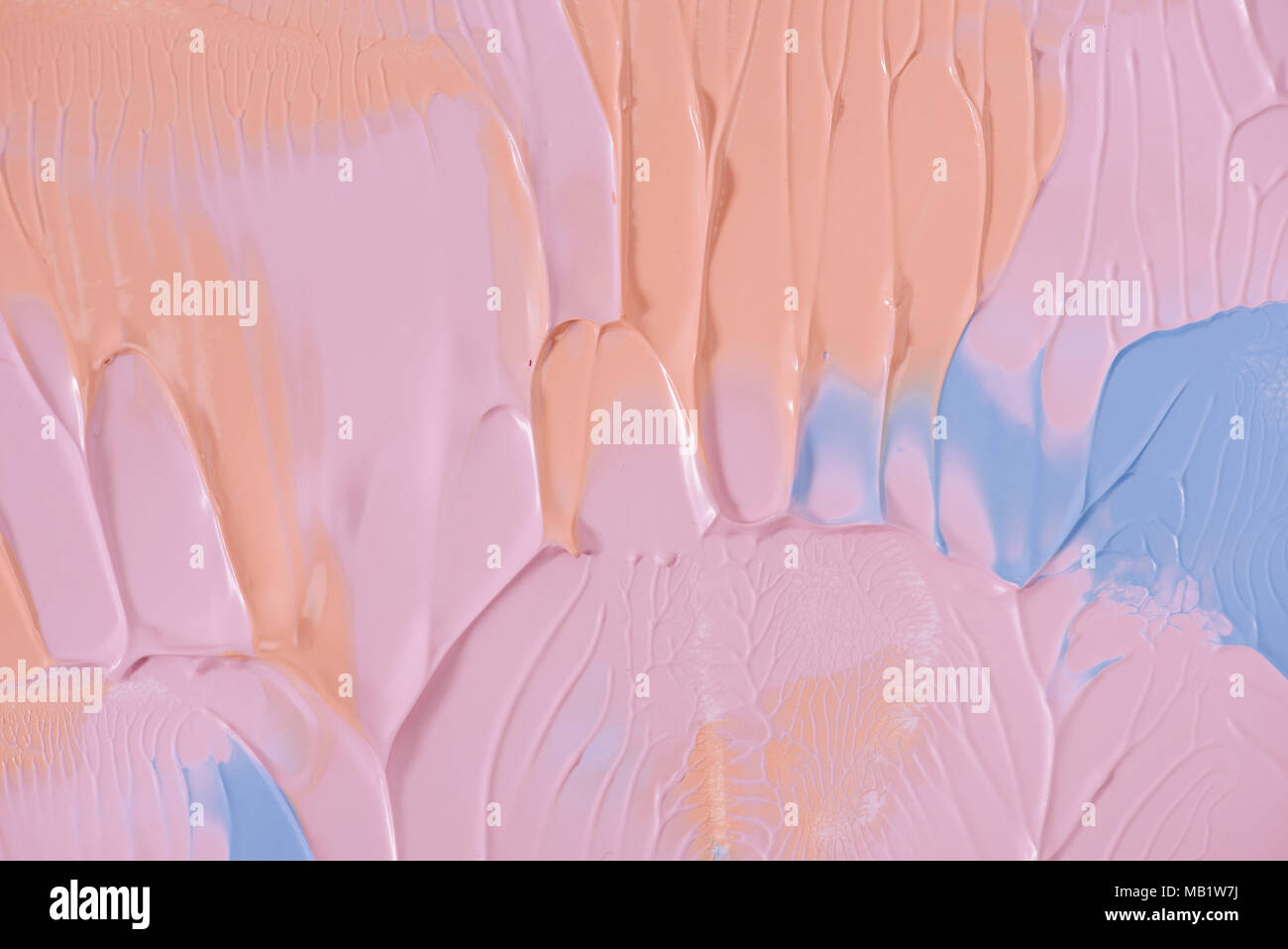 Close-up view of abstract rose, orange et bleu fond peinture Banque D'Images