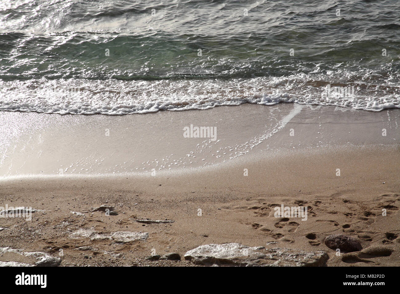 Mer, des traces de pas dans le sable Banque D'Images