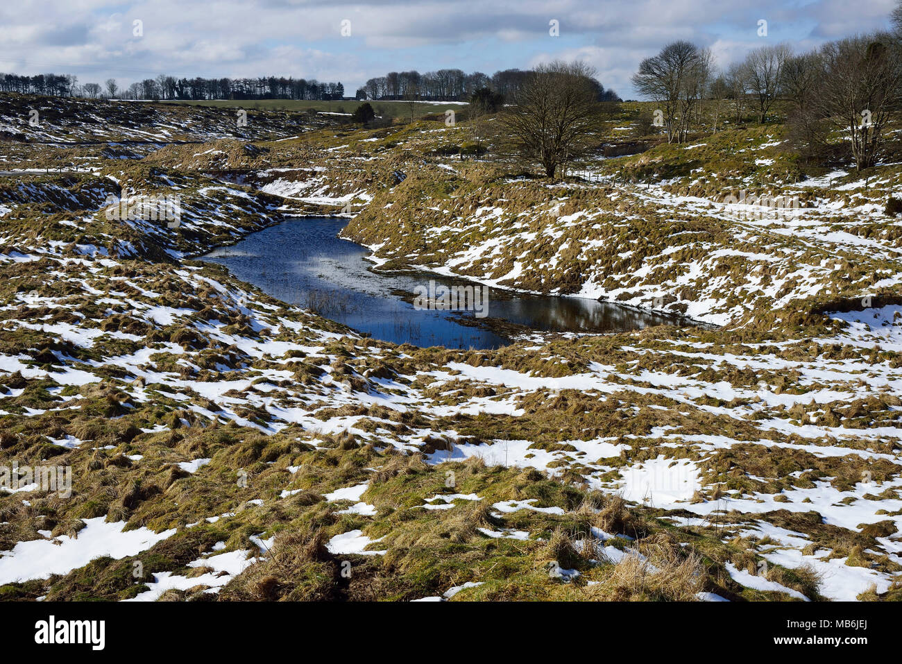 Chartreuse de plomb des étangs dans la neige, collines de Mendip, Somerset Banque D'Images