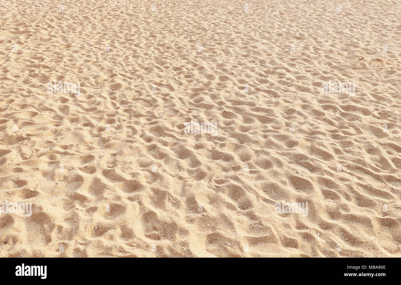 Le sable de plage tropicale comme arrière-plan Banque D'Images