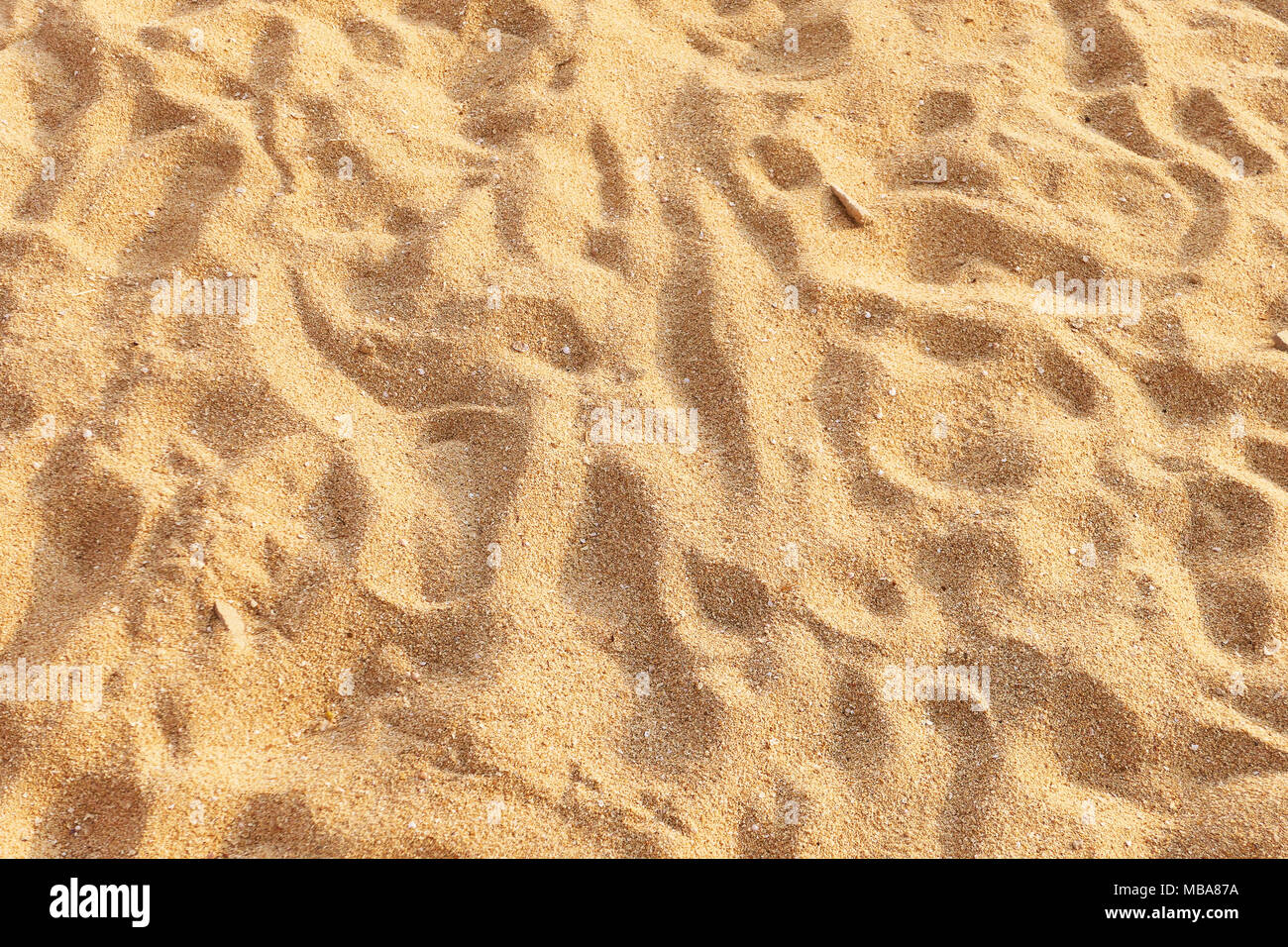 Le sable de plage tropicale comme arrière-plan Banque D'Images