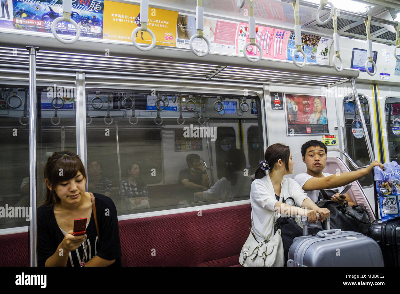 Tokyo Japon,Asie,Orient,aéroport Haneda,ligne Keikyu,train,Asian Asian immigrants ethniques minorités,Oriental,femme femme femme femme adulte adul Banque D'Images