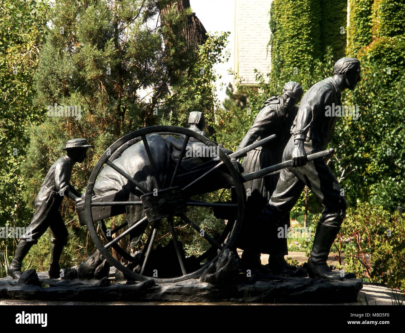 Les Mormons. La charrette à Pioneer Monument, à Temple Square, Salt Lake City. Le mémorial a été conçu en hommage à l'premiers pionniers des années 1850. Banque D'Images