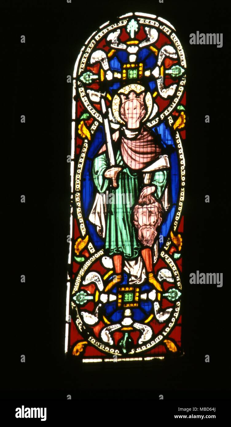 Christian - David et Goliath vitrail représentation de David avec la tête de la tué Goliath. Vitrail de l'église, près de Kilpeck Hereford Banque D'Images