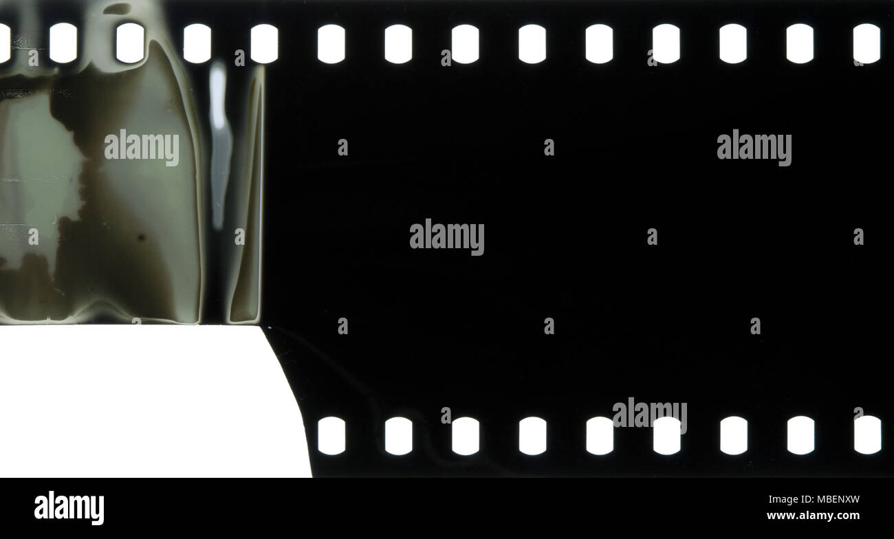 Grunge noir rayé poussiéreux film fixe peut être utilisé comme arrière-plan Banque D'Images