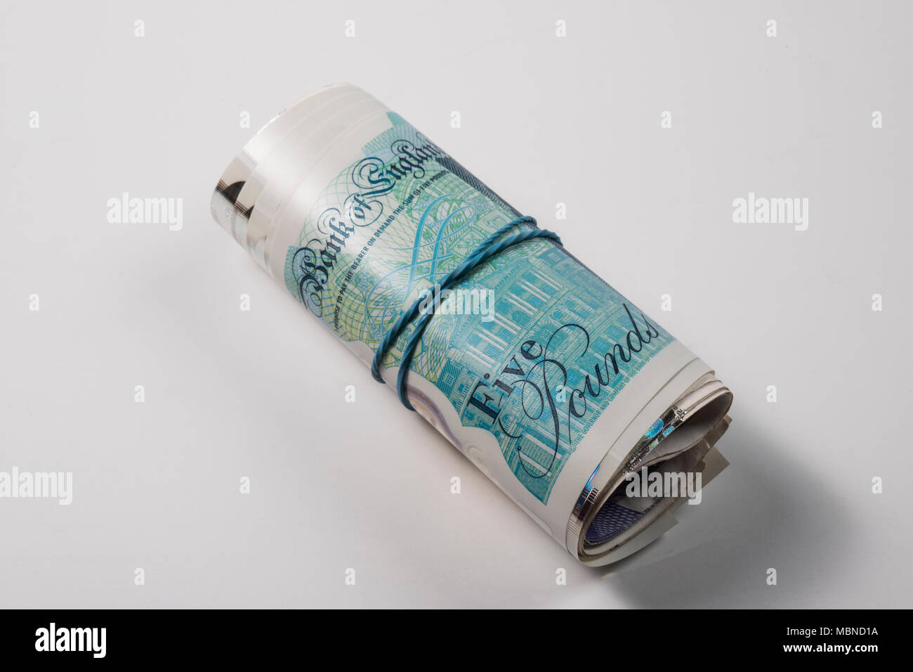Un rouleau de UK €5,00 Note Banque D'Images