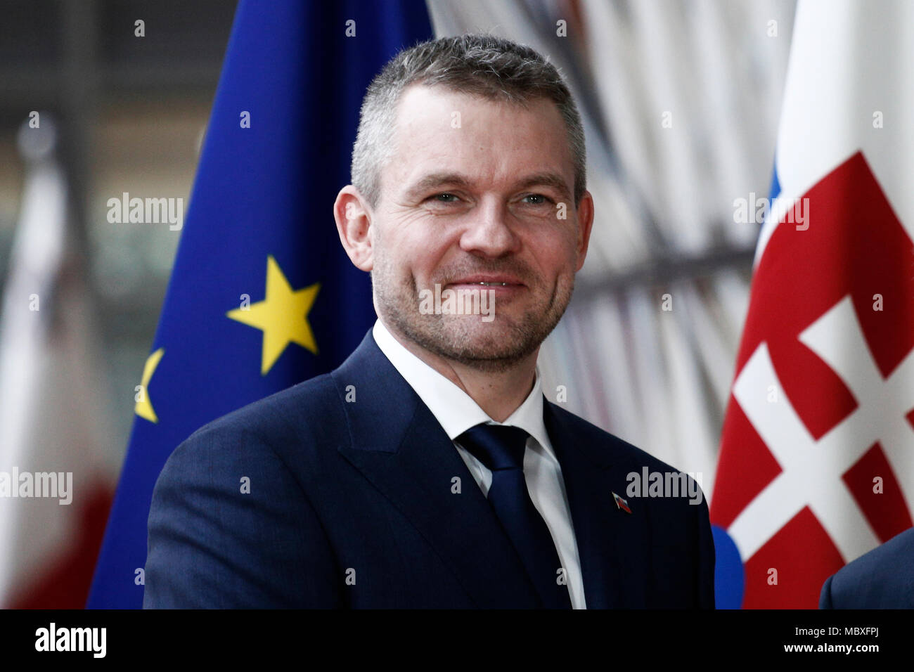 Bruxelles, Belgique. 12 avril 2018.Premier Ministre de la Slovaquie, Peter Pellegrini (L) est accueilli par le président du Conseil européen, Donald Tusk avant une réunion. Alexandros Michailidis/Alamy Live News Banque D'Images