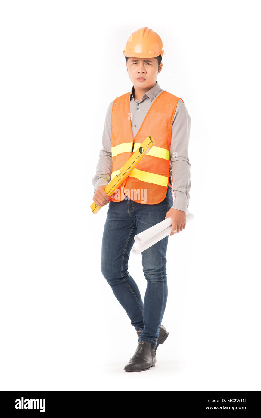 Travailleur de la construction en gilet orange Banque D'Images