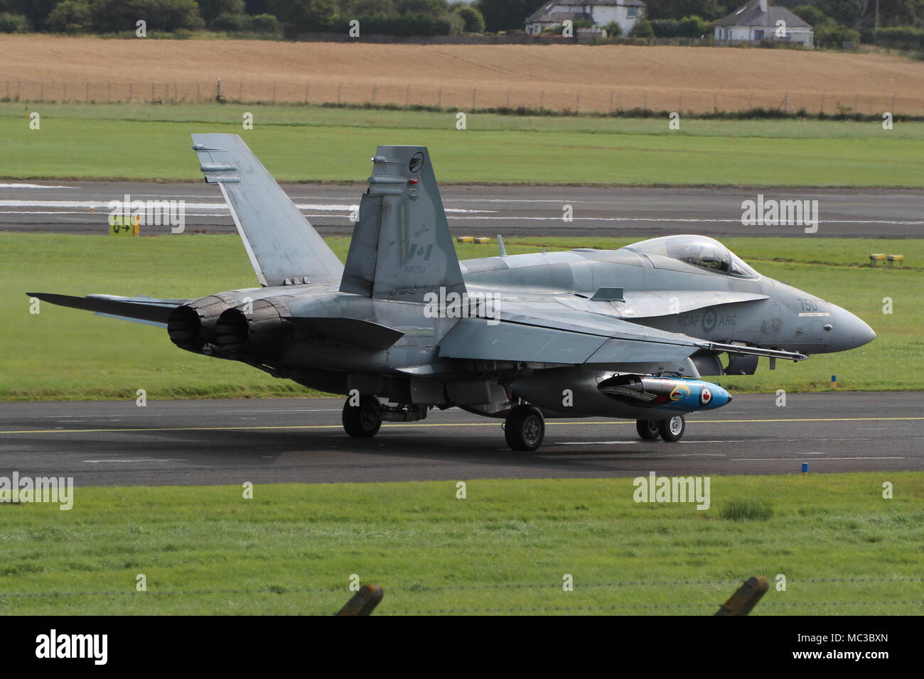 188750, un McDonnell Douglas CF-188un Hornet utilisés par la Royal Canadian Air Force, au départ de l'Aéroport International de Prestwick en Ayrshire, Ecosse. Banque D'Images