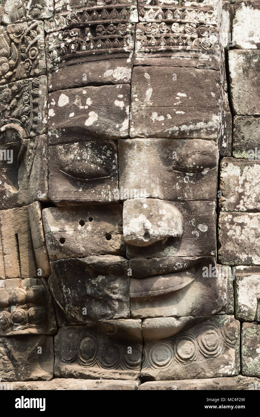 Close up d'un bouddha sculpté le visage, temple Bayon, Angkor Thom, Angkor, site du patrimoine mondial de l'Asie Cambodge Banque D'Images