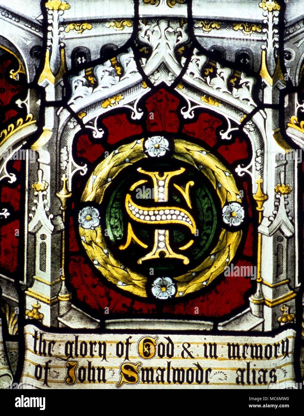 Initiales de John Smallwood sur le vitrail de la fenêtre du souvenir l'église paroissiale de Newbury. Banque D'Images