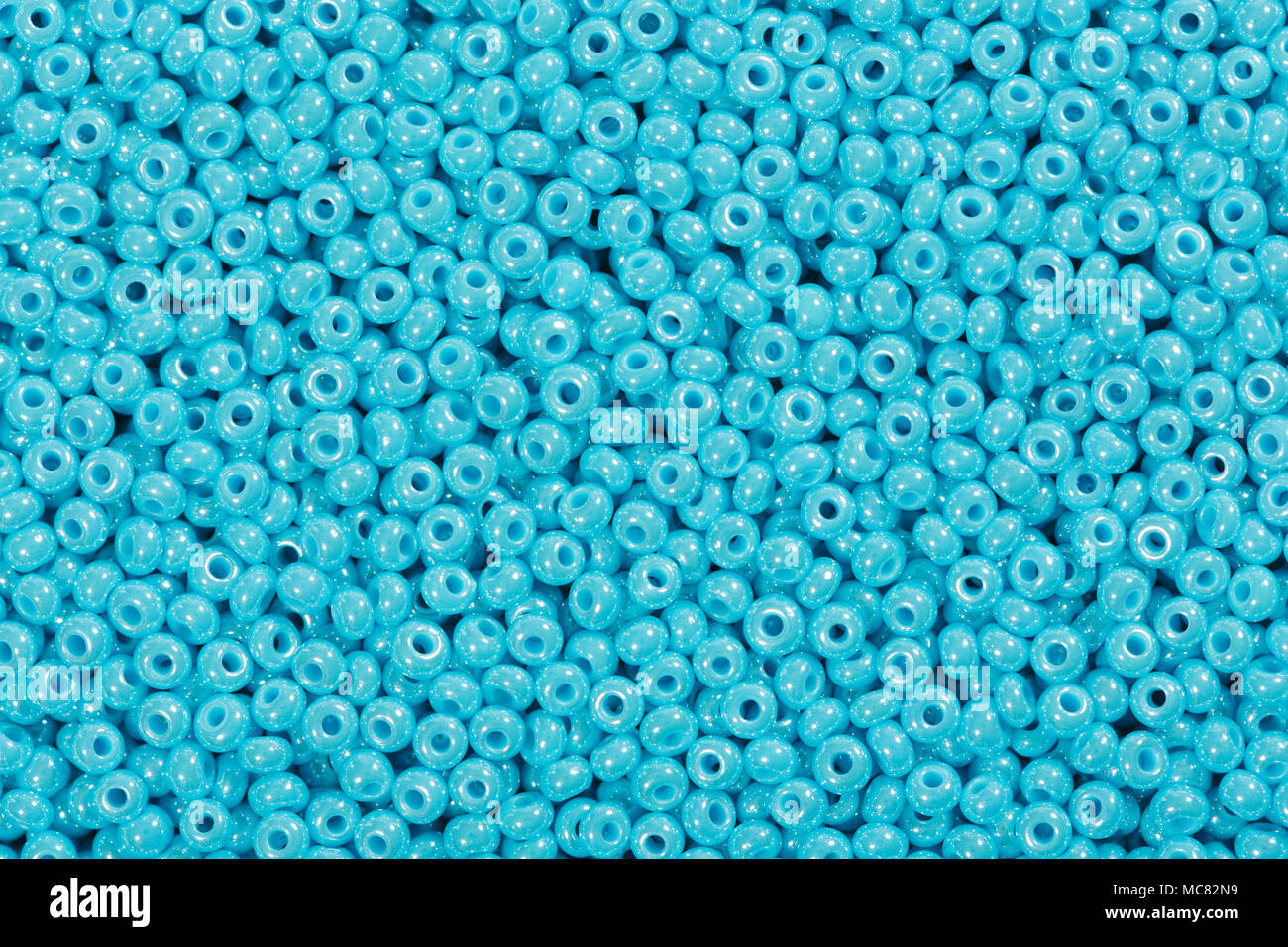 Canne en verre bleu bébé beaucoup de perles. Banque D'Images