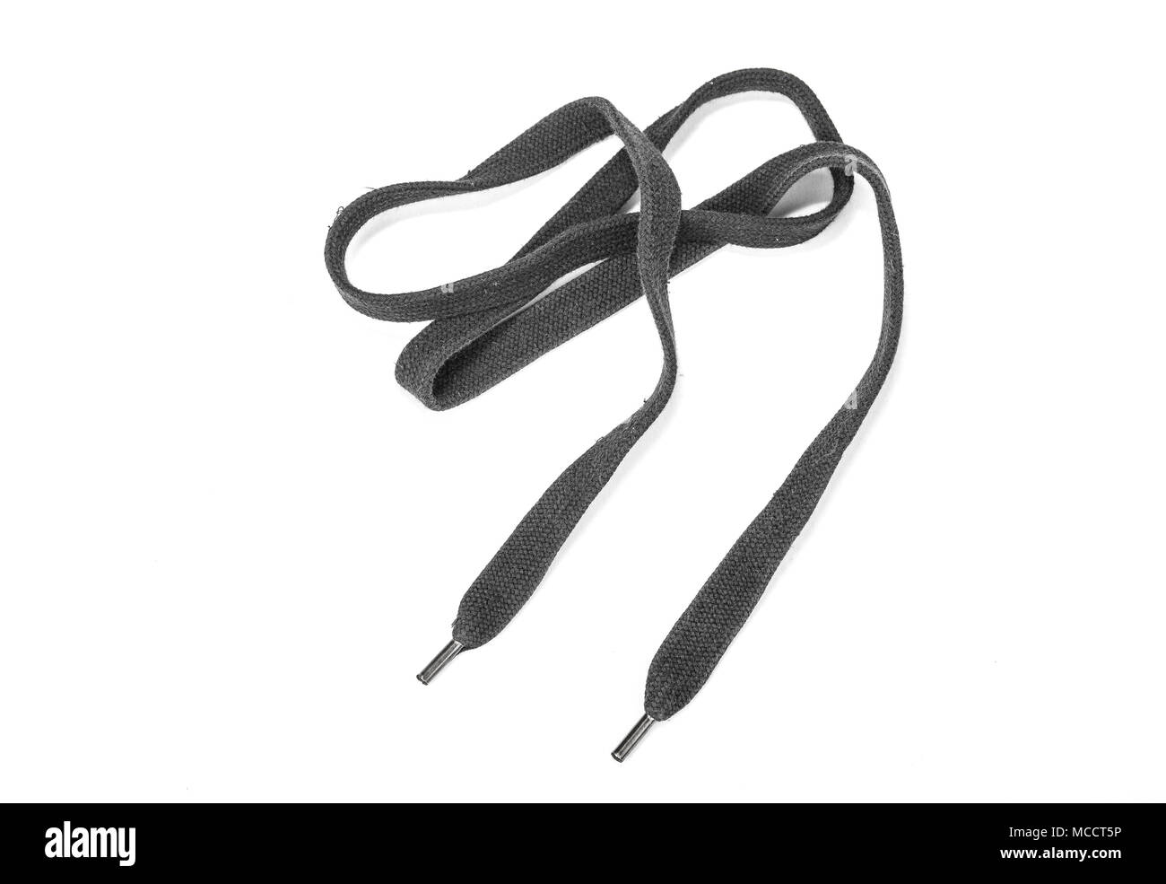 Lacet noir sur le fond blanc Banque D'Images