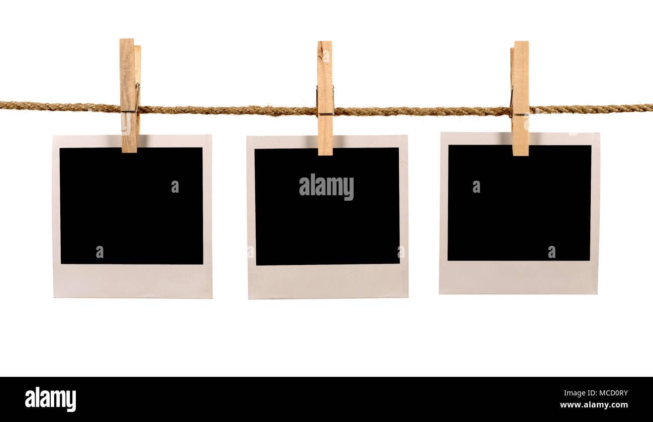 Plusieurs style polaroid vierge instant photo impression de cadres  accrochés sur une corde ou d'un lave-ligne, fond blanc Photo Stock - Alamy