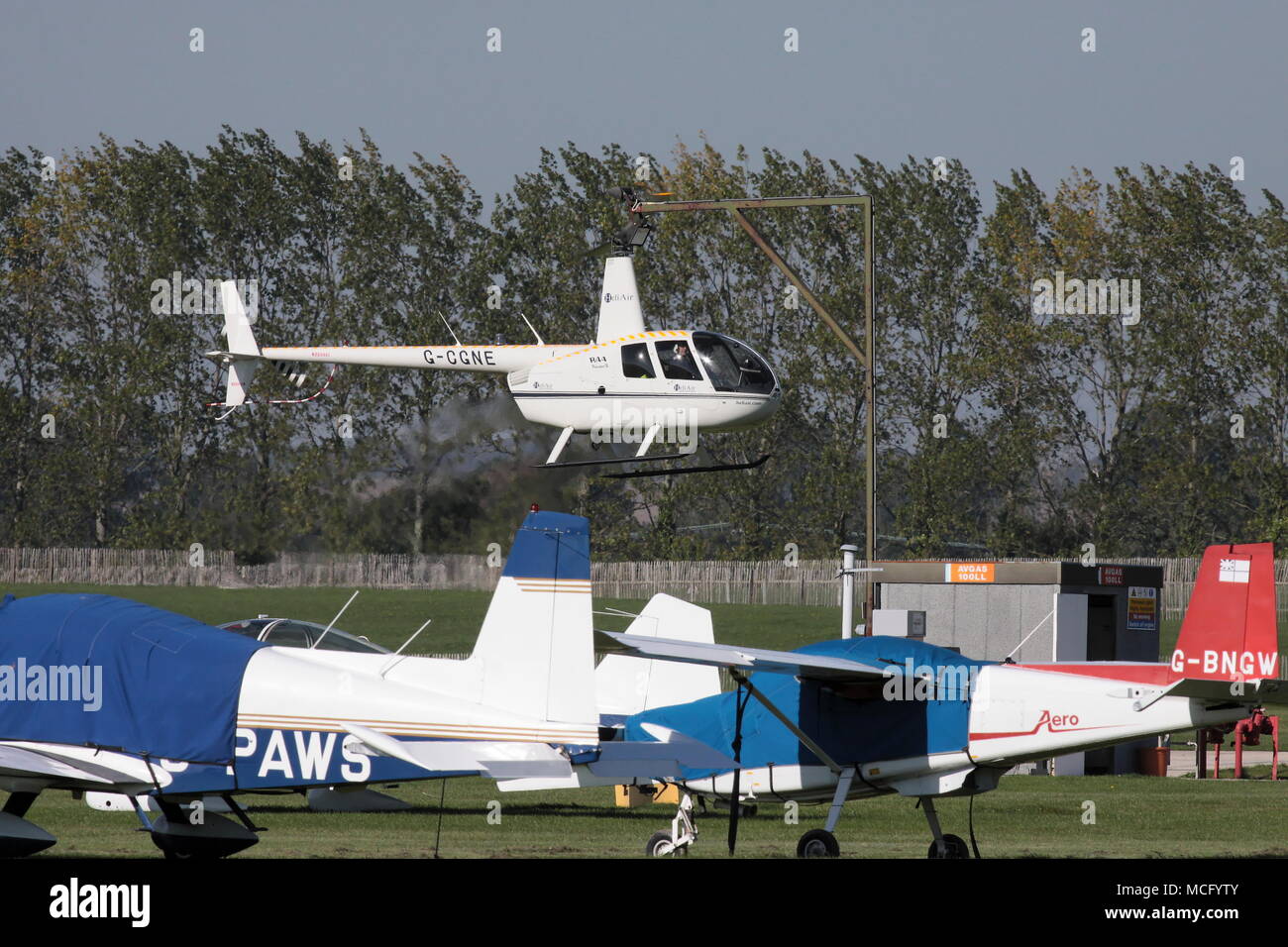 Robinson R44 Raven II Goodwood hélicoptère aérodrome et circuit de course Chichester West Sussex England Banque D'Images