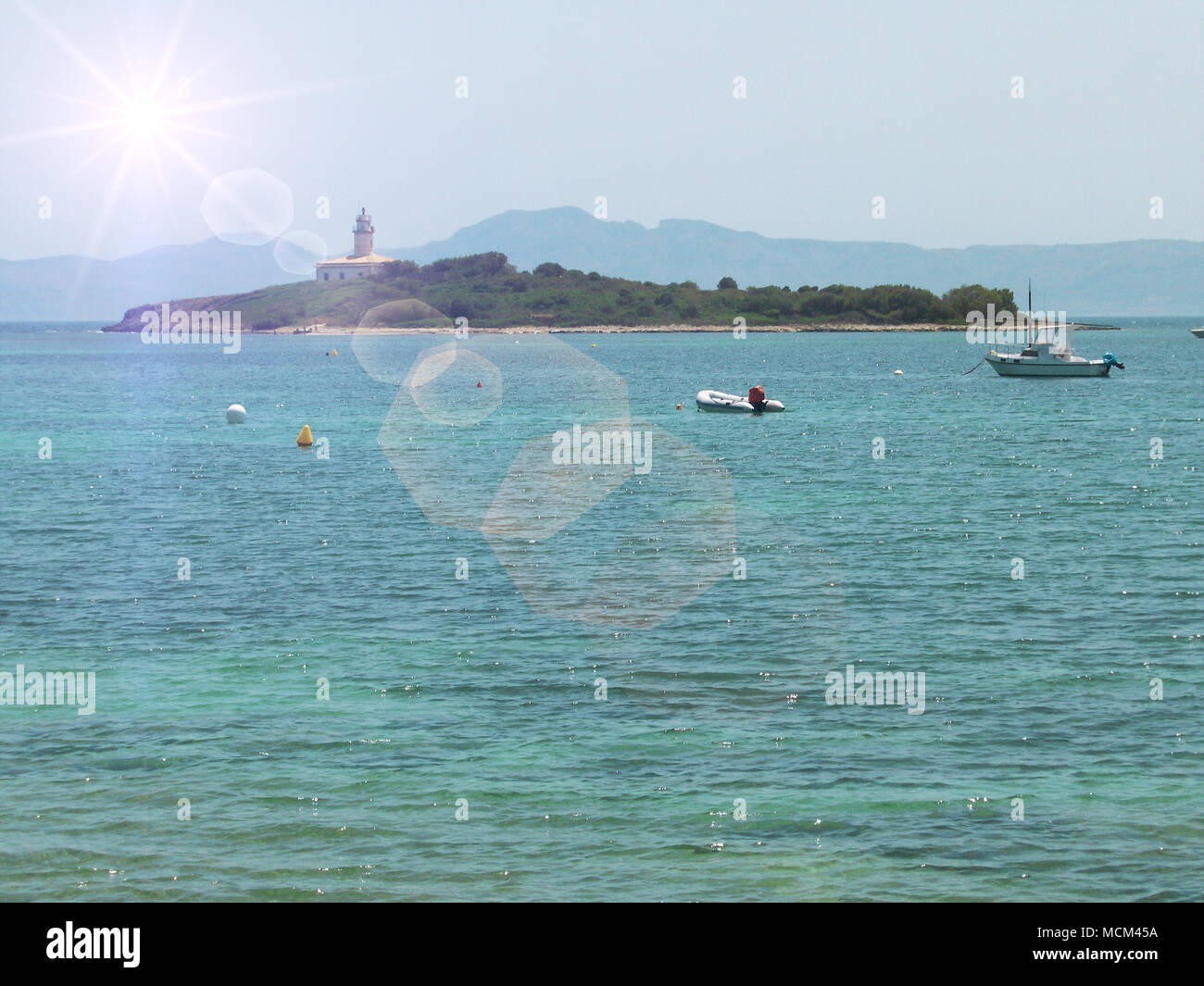 Phare d'Alcanada, sur l'île d'Aucanada, à Majorque, Îles Baléares, Espagne Banque D'Images