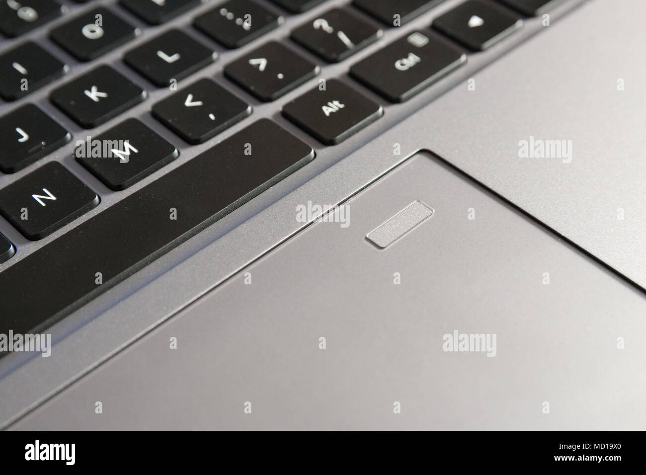 Scanner d'empreintes digitales sur le pavé tactile d'un ordinateur portable, clavier partielle voir Banque D'Images