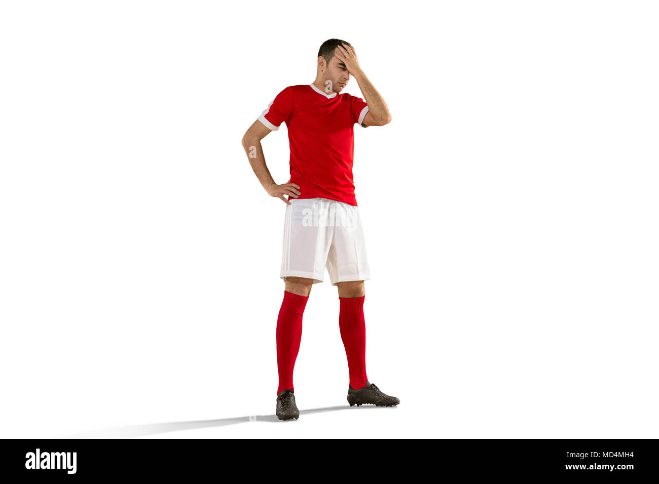 Joueur de football ou soccer malheureux avec palm sur son visage Banque D'Images
