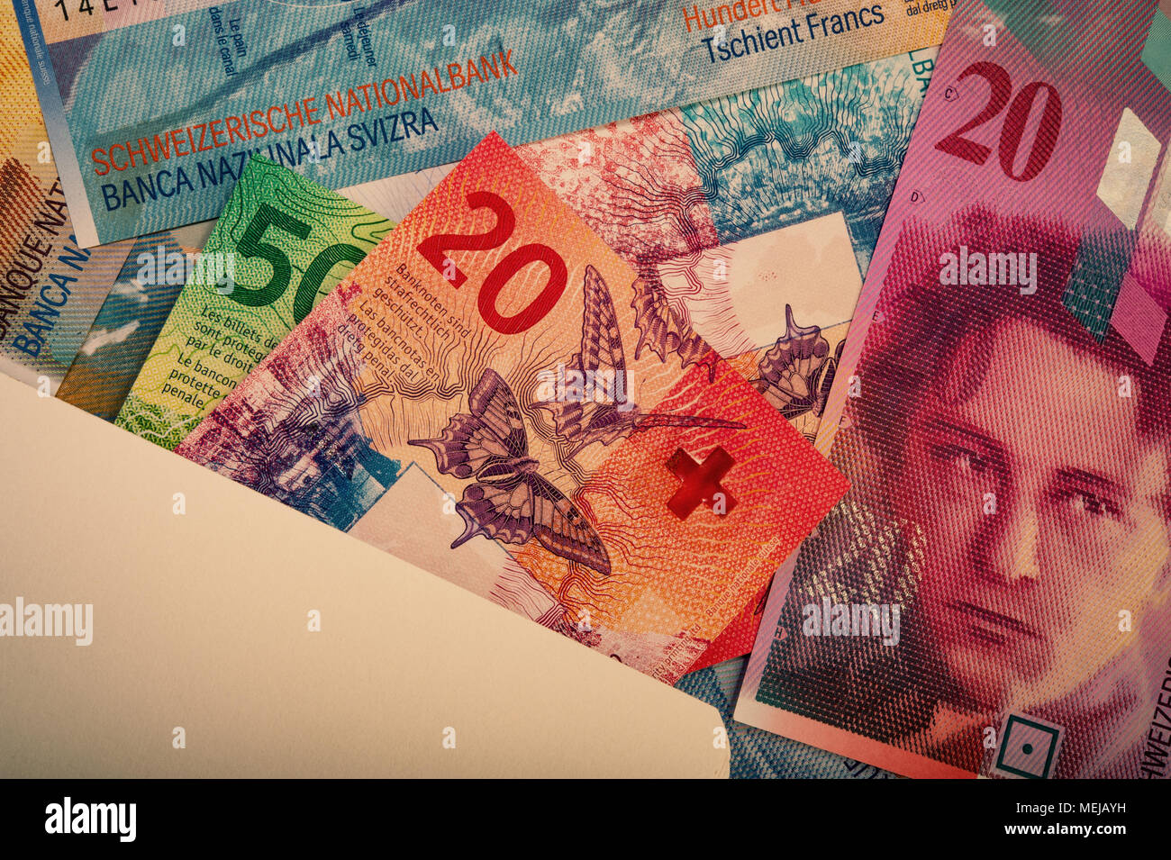 Les billets de banque suisses - une collection d'anciens et nouveaux francs vingt notes. L'argent comptant. Banque D'Images