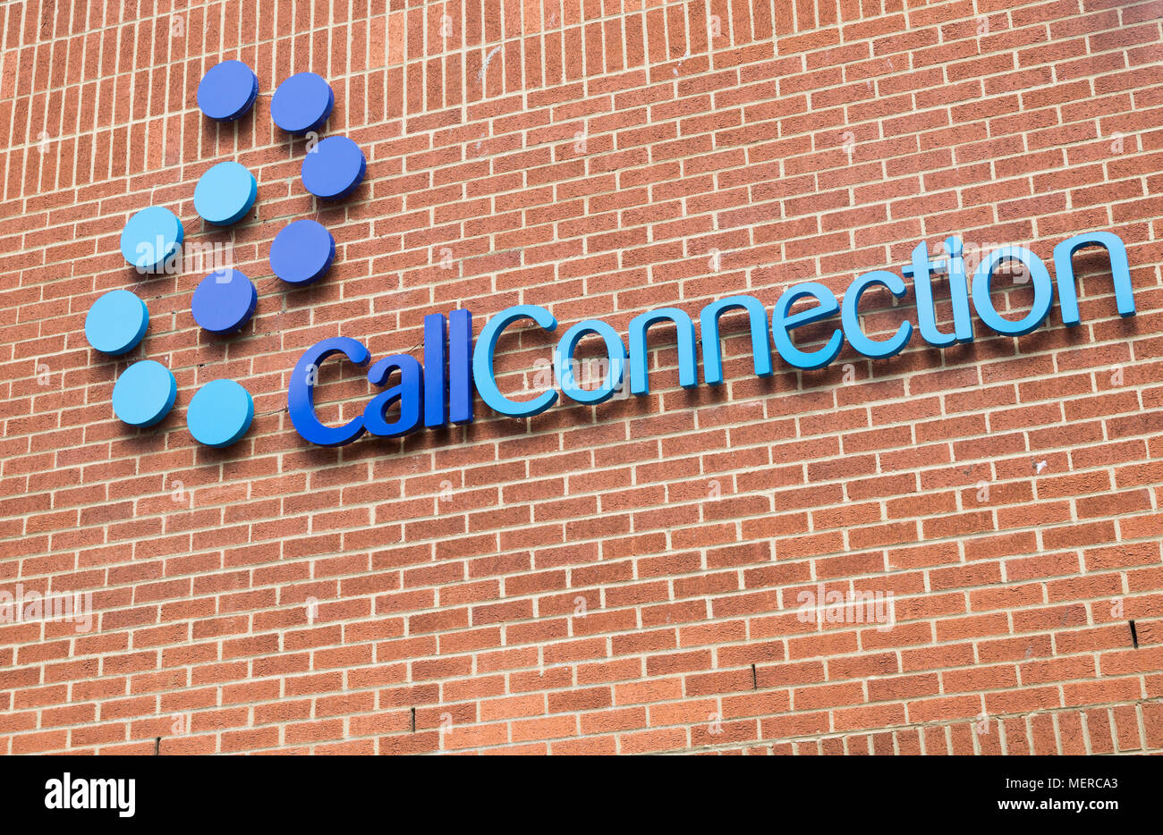 Connexion d'appel centre d'appels téléphoniques enseigne sur mur de brique, Ipswich, Suffolk, Angleterre, RU Banque D'Images