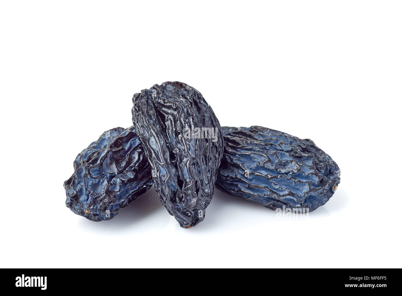 Trois raisins noir sur blanc Banque D'Images