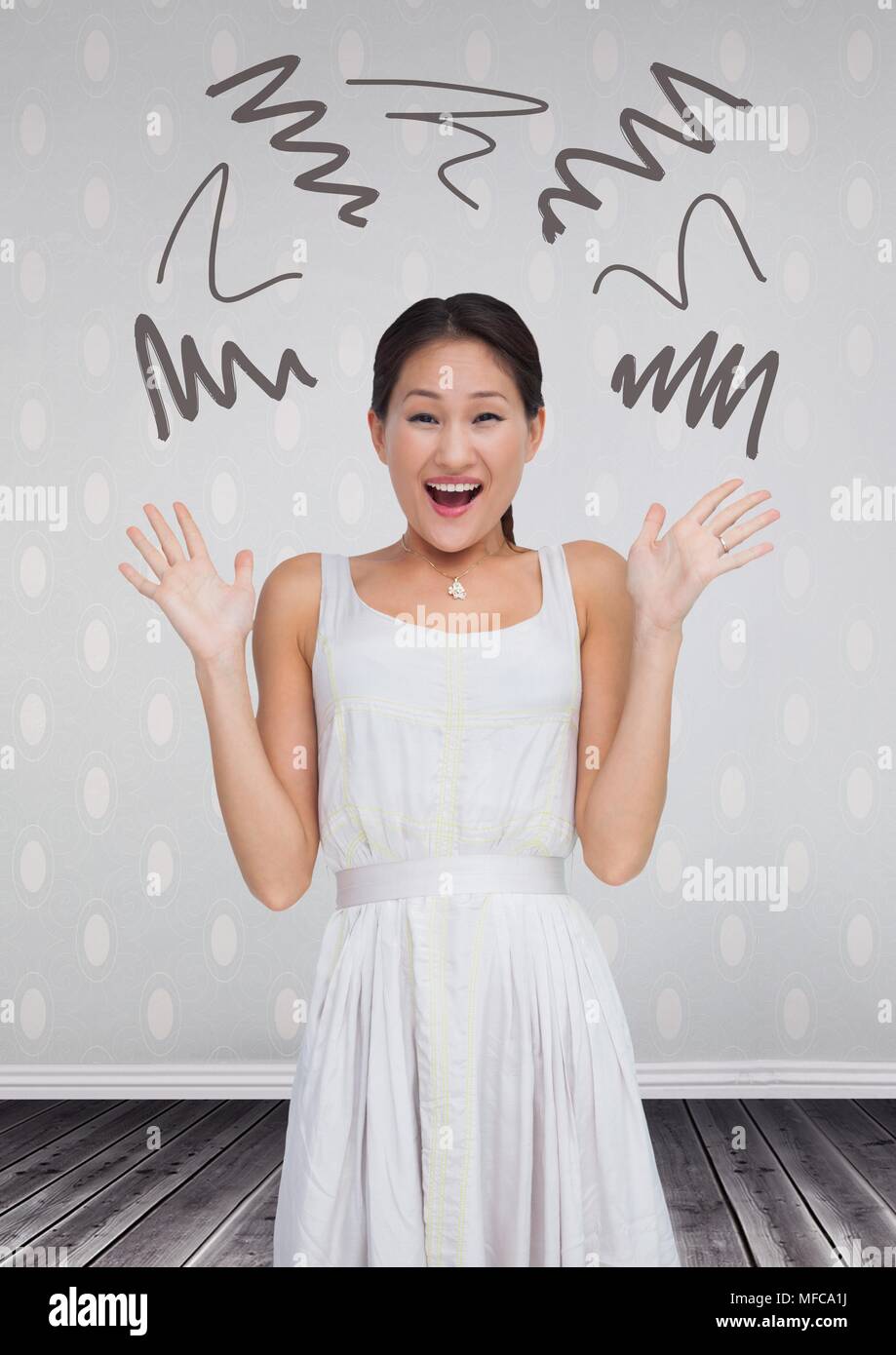 Surpris femme avec doodles dans la chambre Banque D'Images