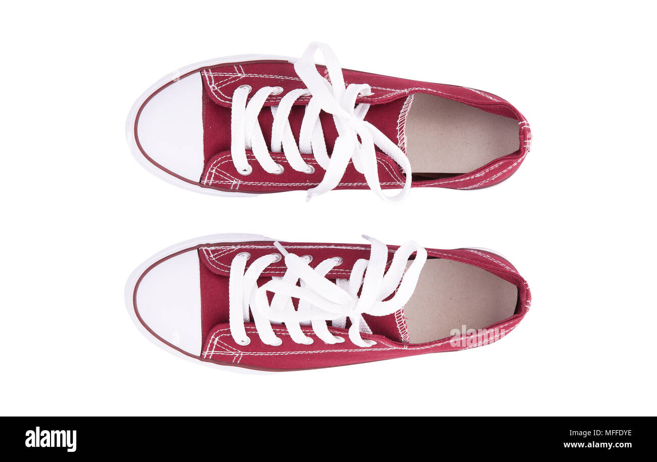 Red sneakers top view close up isolé sur fond blanc Banque D'Images Red sneakers top view close up isolé sur fond blanc Banque D'Images