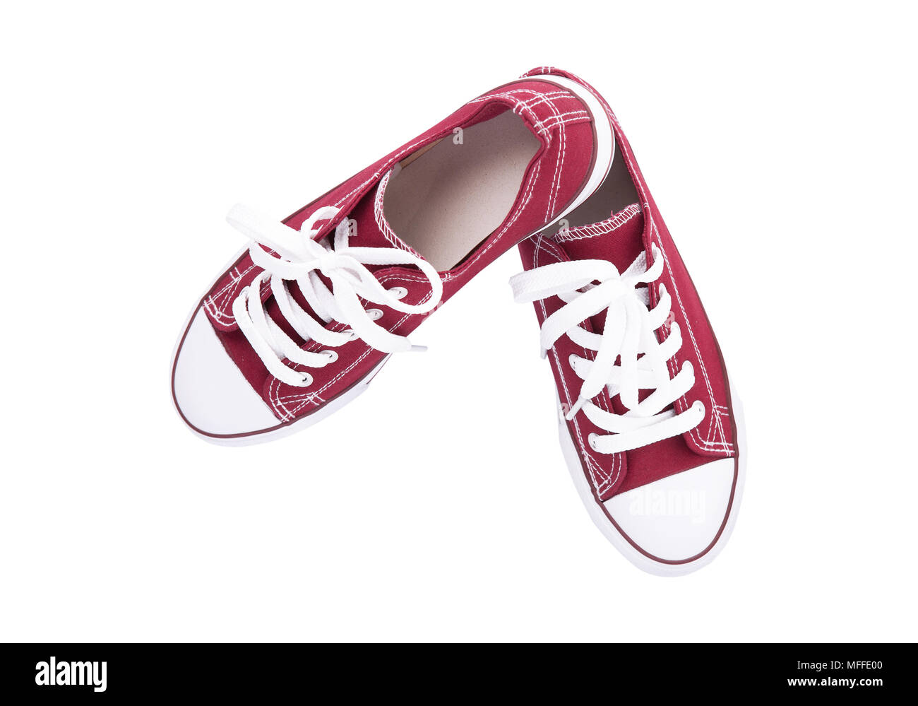Red sneakers top view close up isolé sur fond blanc Banque D'Images Red sneakers top view close up isolé sur fond blanc Banque D'Images