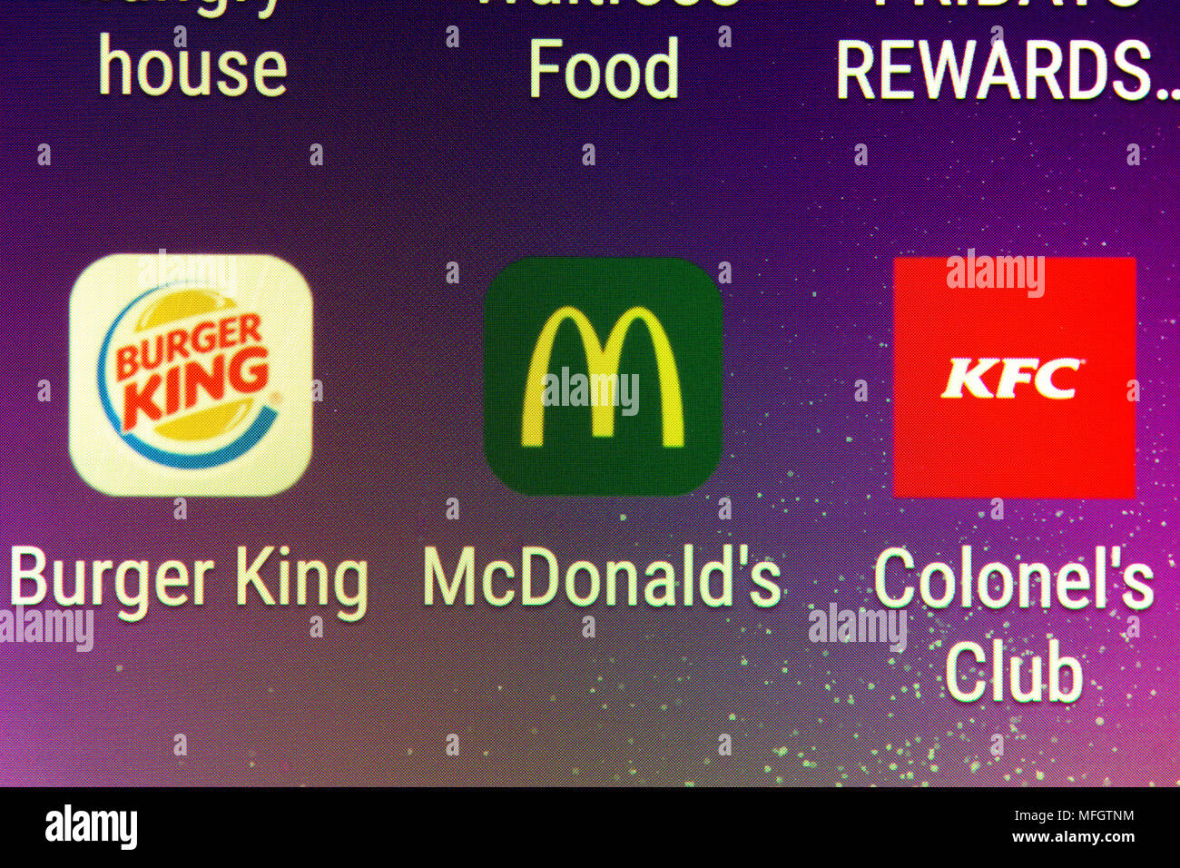 Un gros plan sur le Burger King, McDonald's et KFC téléphone mobile apps Banque D'Images
