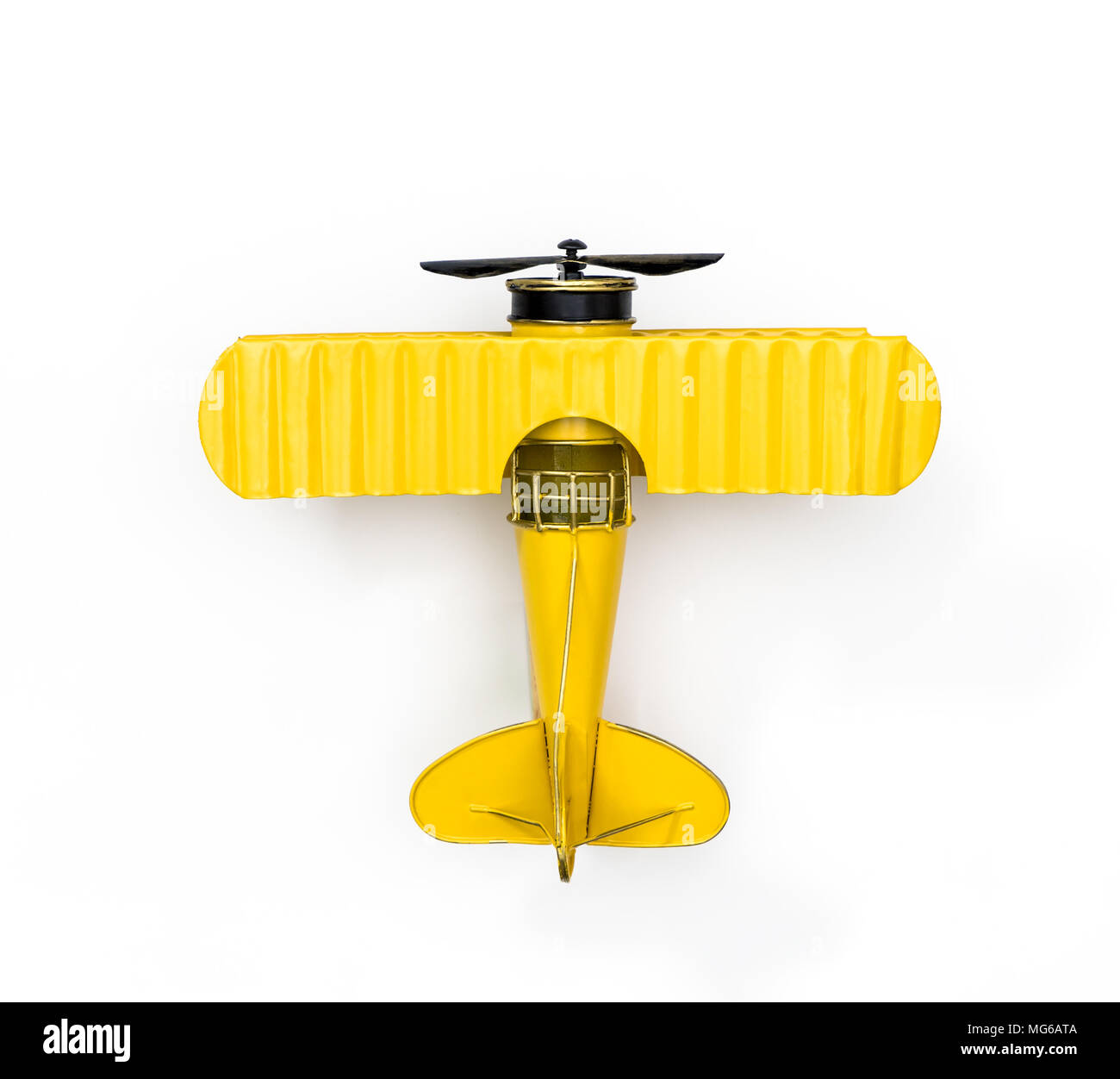 Le métal jaune jouet avion isolated on white Banque D'Images Le métal jaune jouet avion isolated on white Banque D'Images