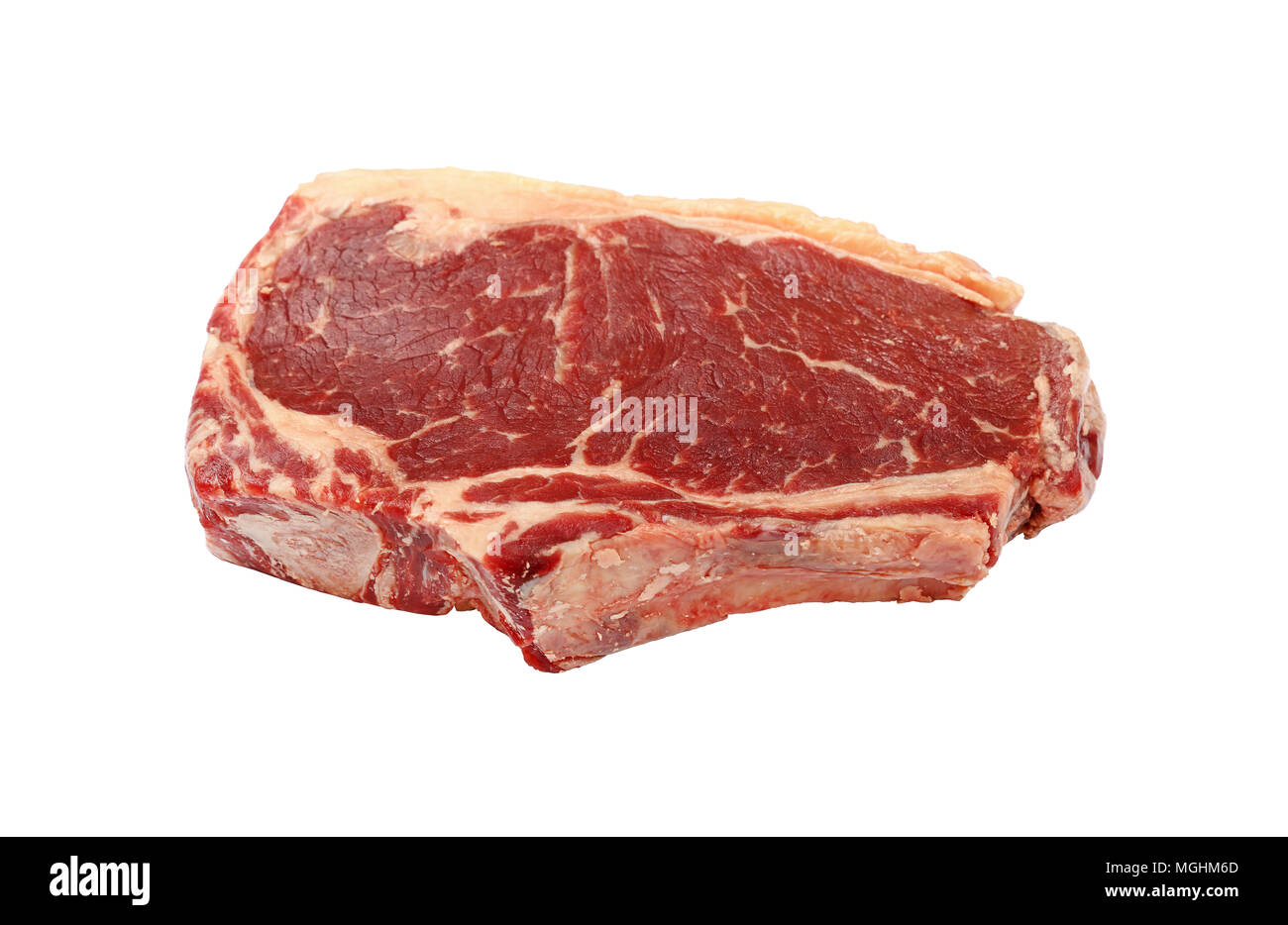 Close up one raw Ribeye Steak de boeuf avec os thoracique isolé sur fond blanc, high angle view Banque D'Images