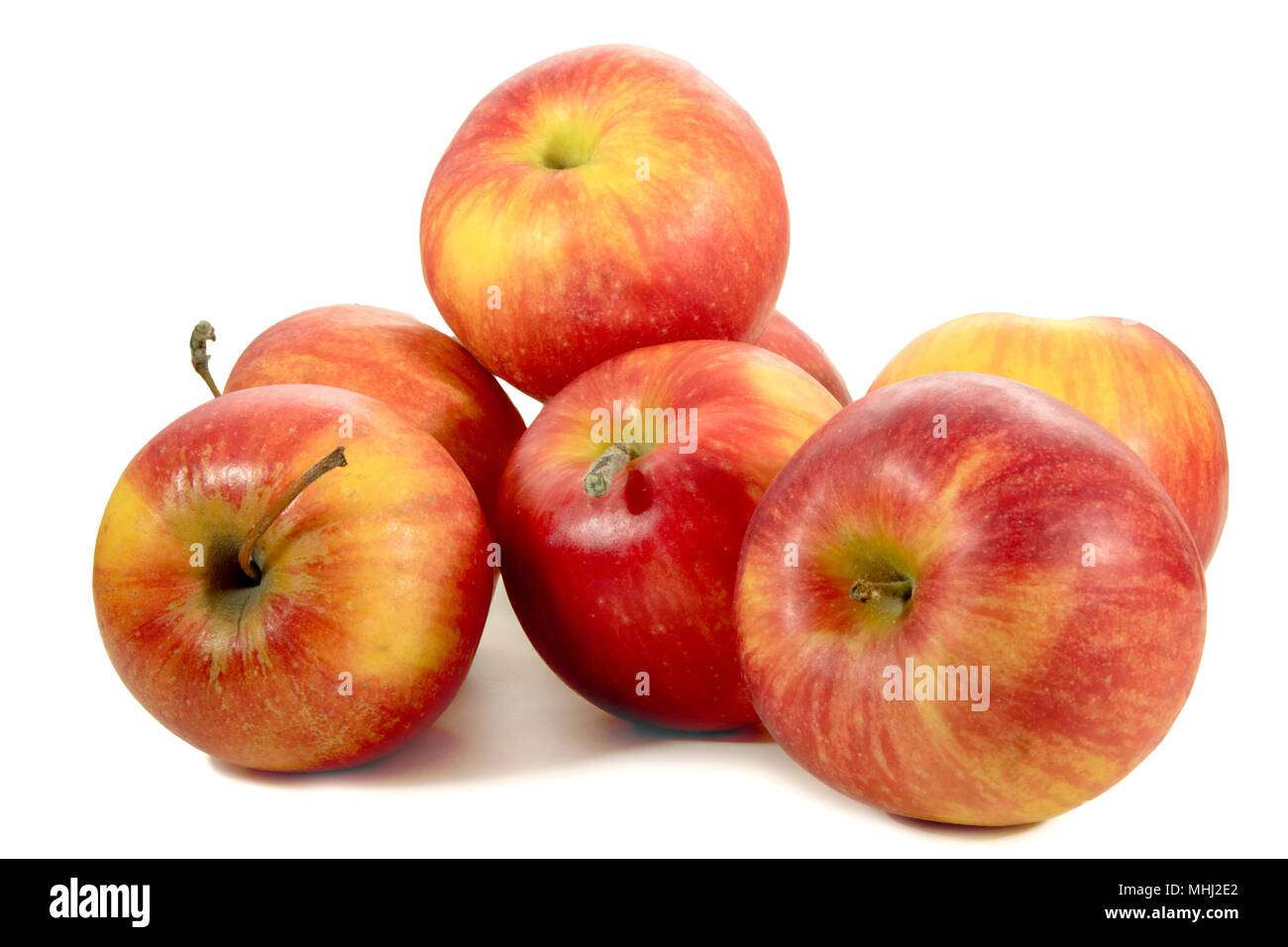 Photo venu des pommes rouges sur fond blanc Banque D'Images