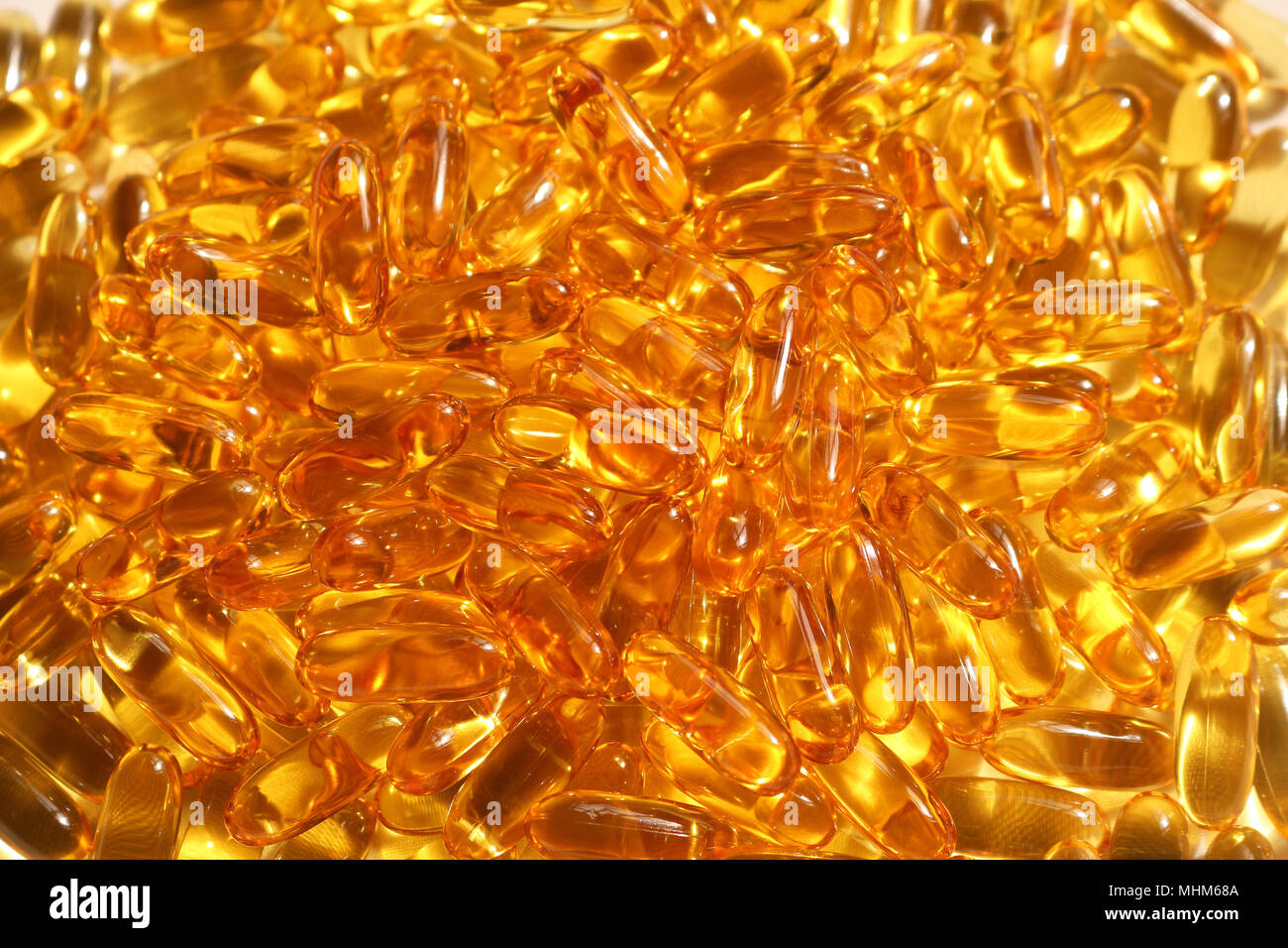 L'huile de foie de morue capsules background Banque D'Images