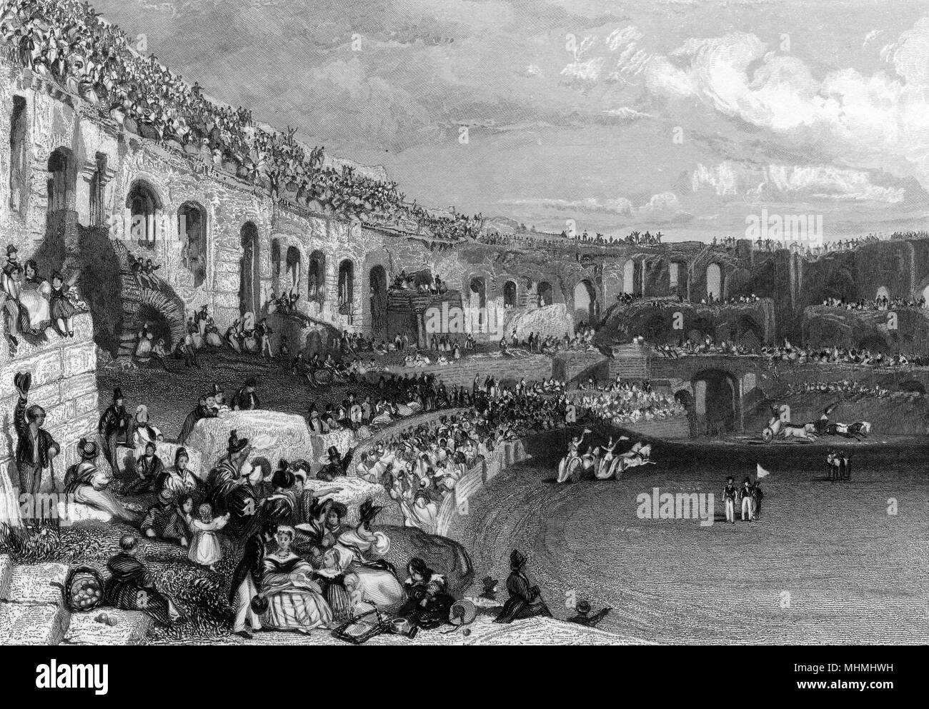 Les spectateurs à regarder une course de chars modernes dans l'amphithéâtre romain de Nîmes, France, 1835 Date : 1835 Banque D'Images