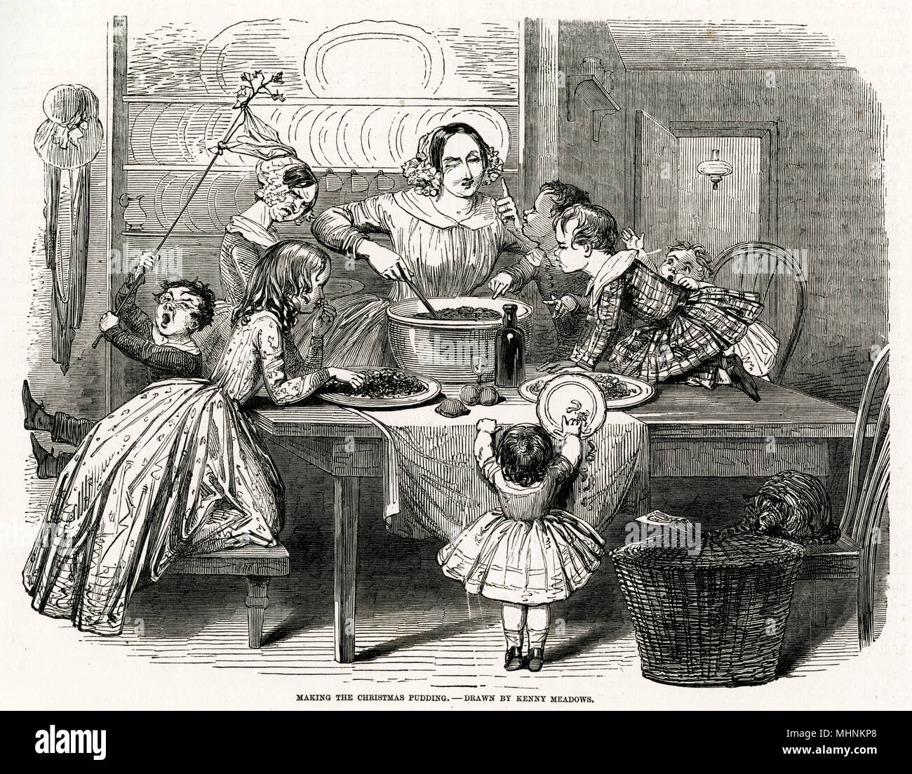 Mère making Christmas plum-pudding, avec ses enfants essayant d'obtenir un avant-goût. Date : 1850 Banque D'Images