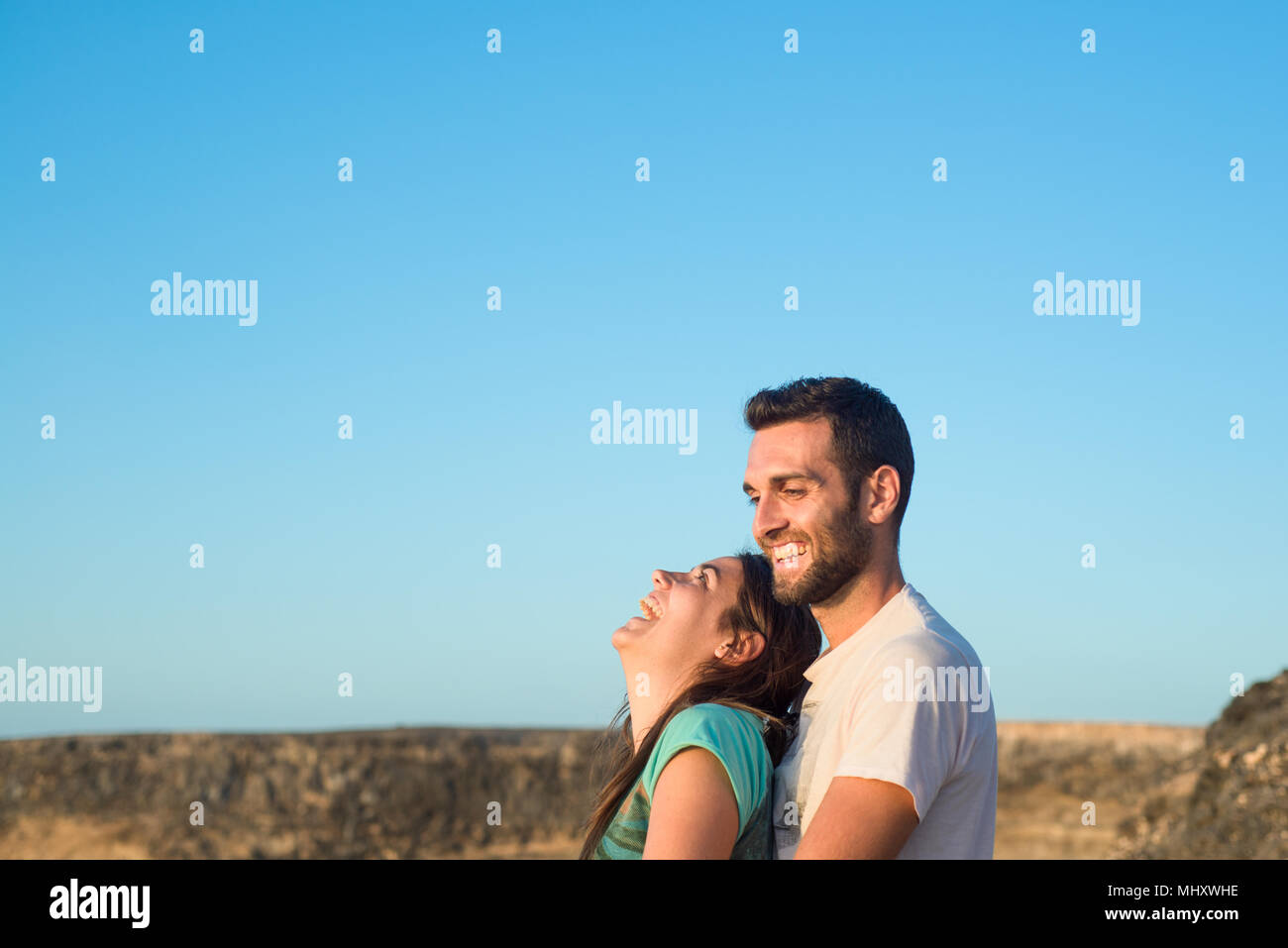 Couple laughing, Corralejo, Fuerteventura, Îles Canaries Banque D'Images