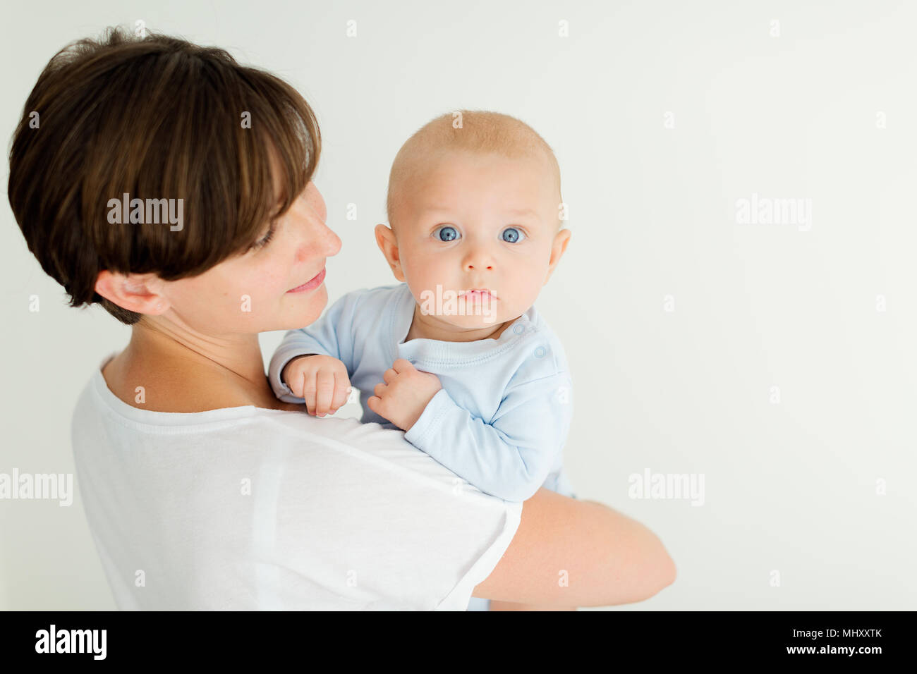 Mother holding baby boy, Banque D'Images