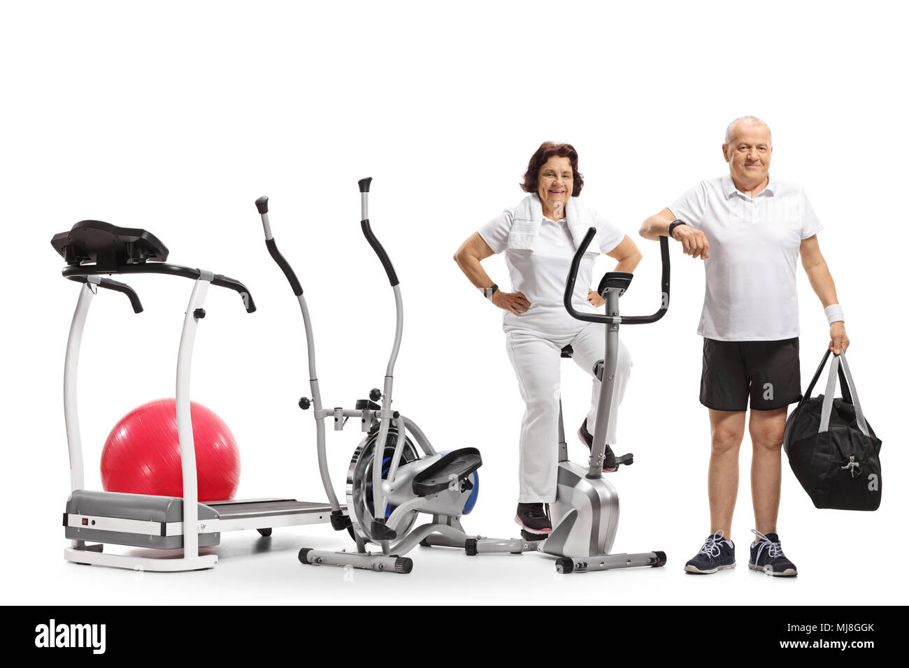 Femme mature et un homme mûr avec l'exercice de machines virtuelles isolé sur fond blanc Banque D'Images