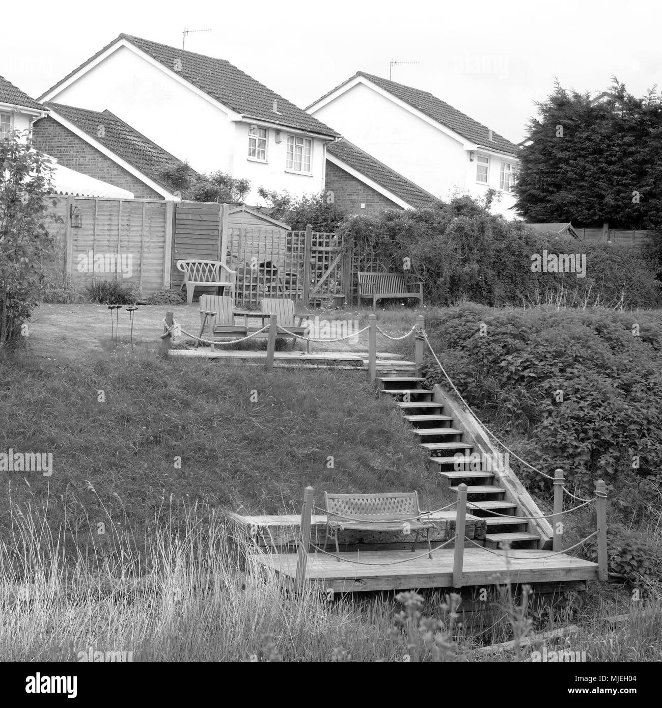 Mai 2018 - Les maisons qui ont créé leur propre espace ouvert et d'accès à la rivière derrière la maison Banque D'Images