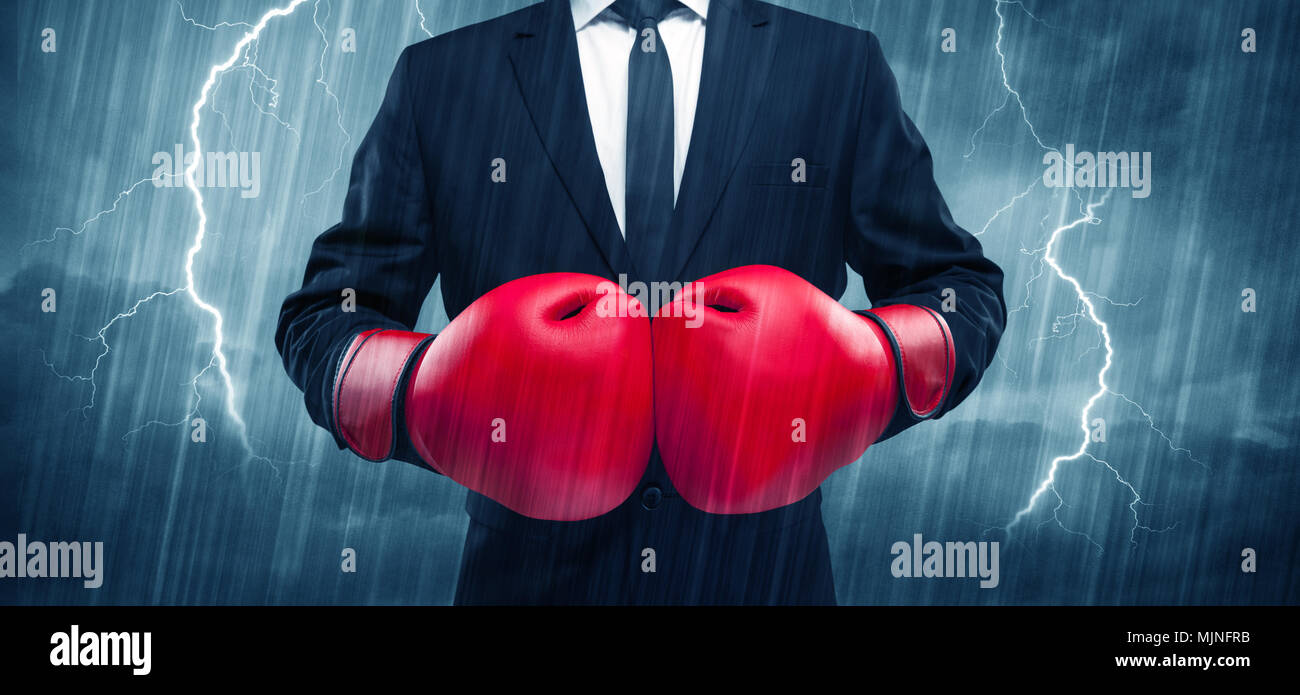 Une dangereuse personne de ventes étant prêt pour un combat concept avec  des gants de boxe rouge et thunder lightning en arrière-plan Photo Stock -  Alamy