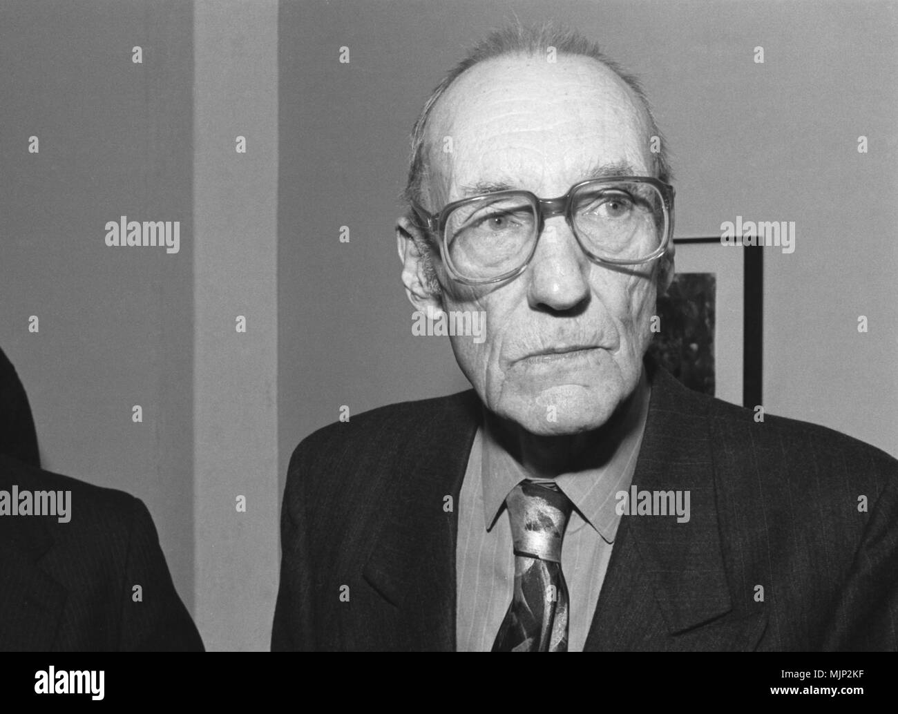 Écrivain et artiste visuel William Burroughs à une galerie d'art de Chicago présentant son travail d'ouverture en 1988. Banque D'Images