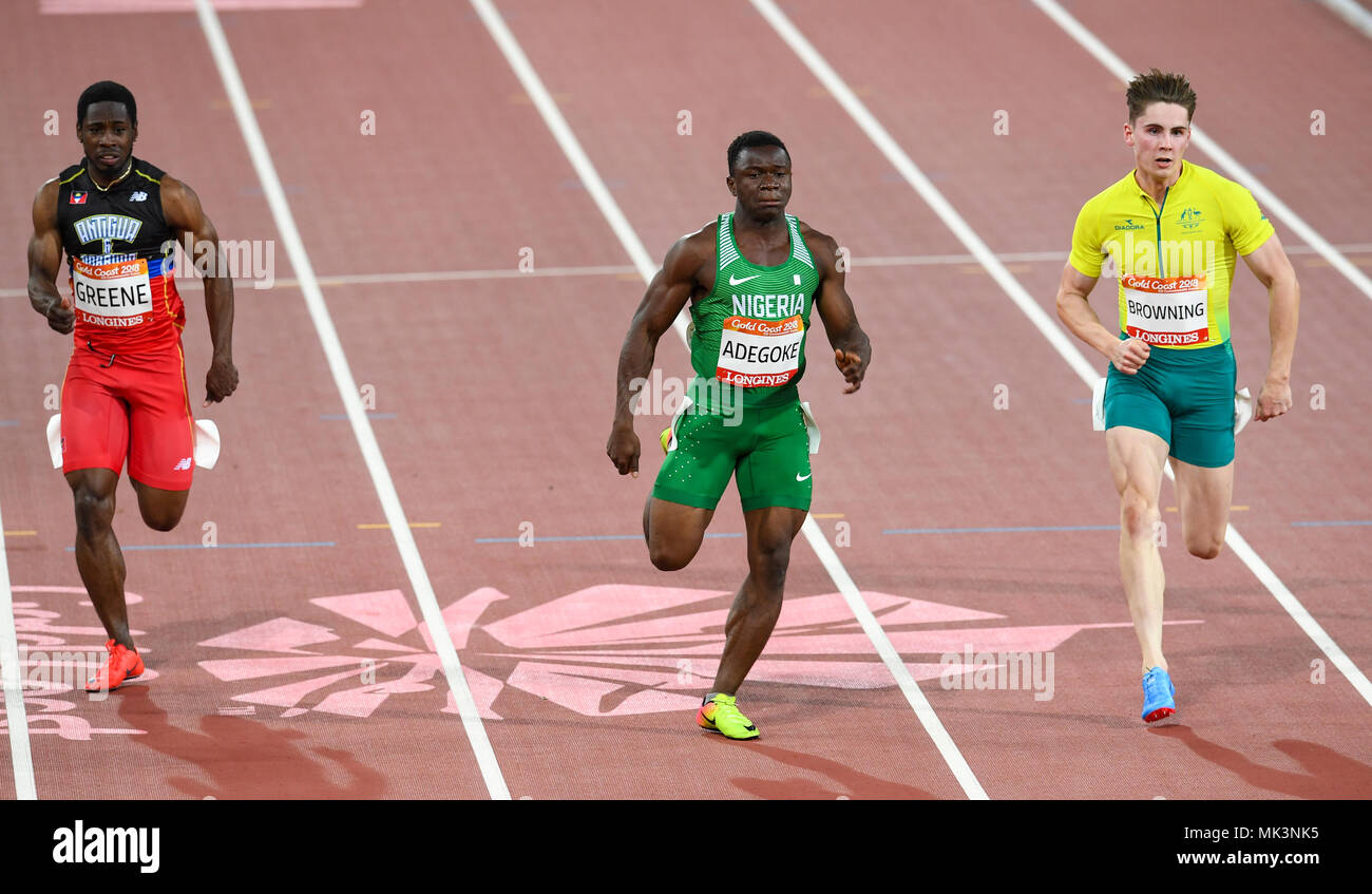 GOLD COAST, AUSTRALIE - 8 avril : Cejhae Greene, Enoch Olaoluwa Adegoke, Rohan Browning concurrentes dans le le 100 m semi- finale à la Côte d'Or 2018 Banque D'Images