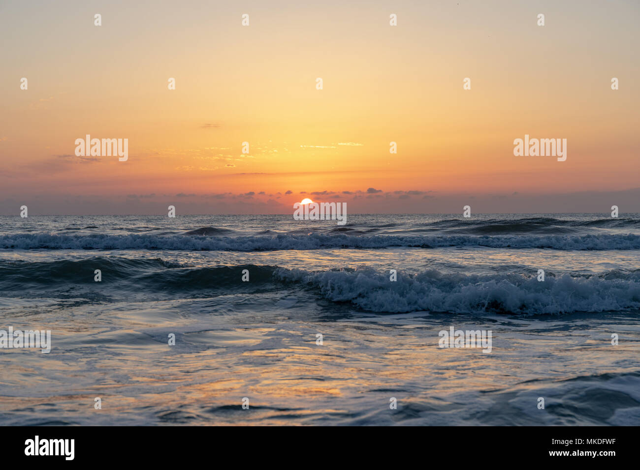 Lever de soleil sur la plage Banque D'Images