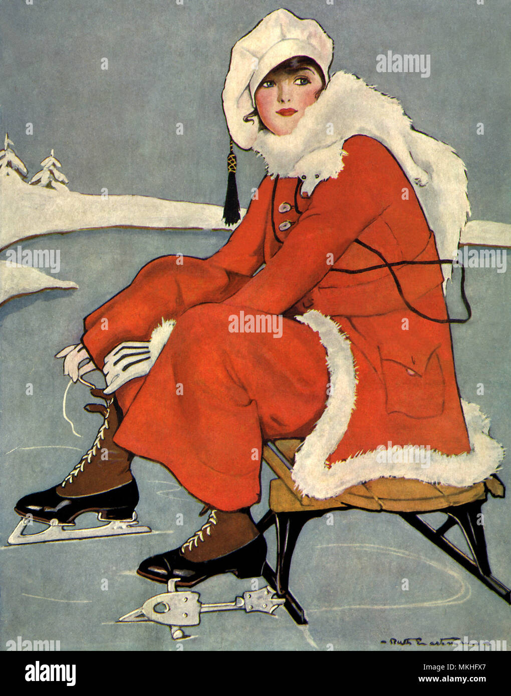 Woman putting sur patins à glace Banque D'Images